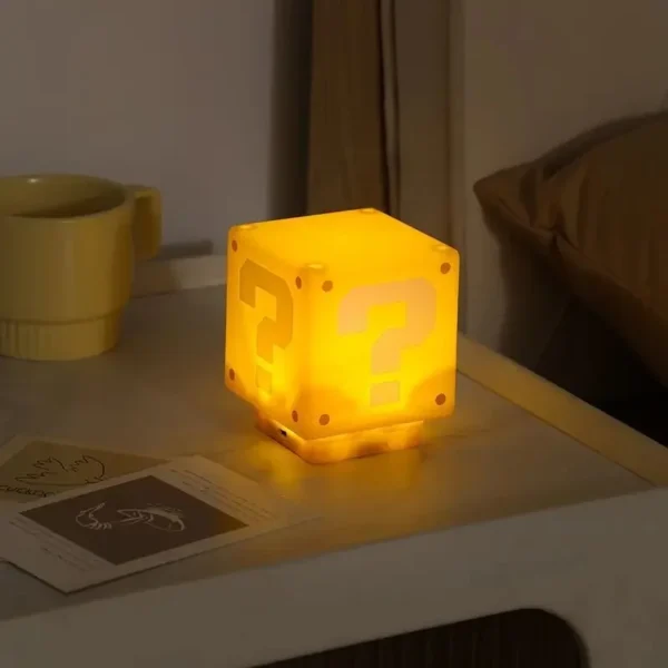 Brick-shaped LED lamp with a question mark and music.