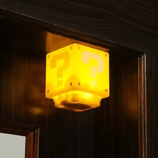 Brick-shaped LED lamp with a question mark and music.
